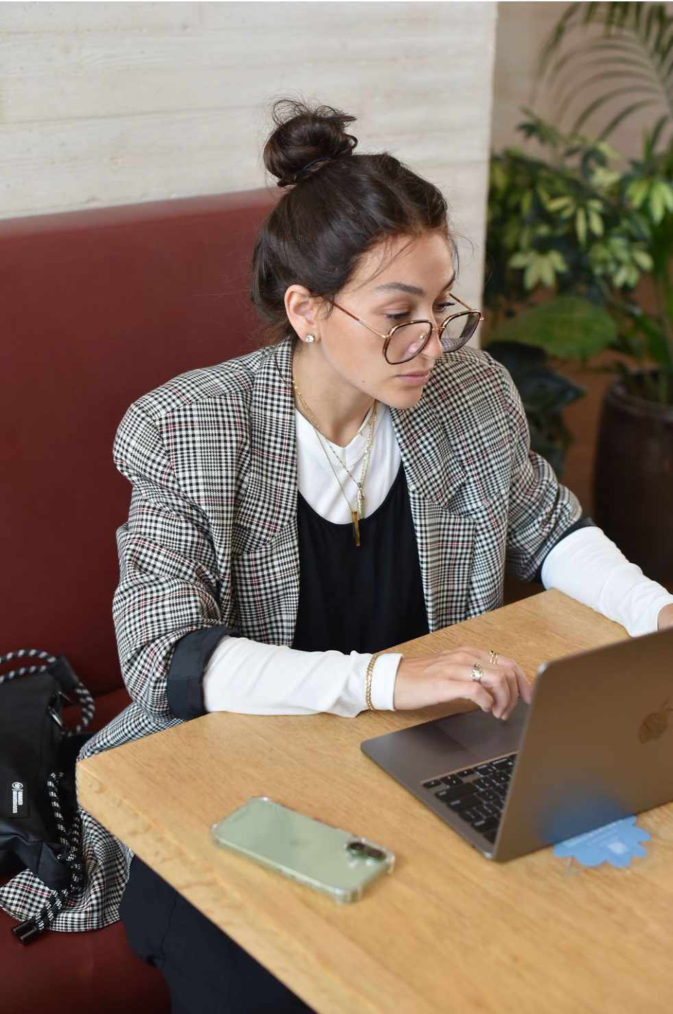 Tova at her laptop, researching for a client